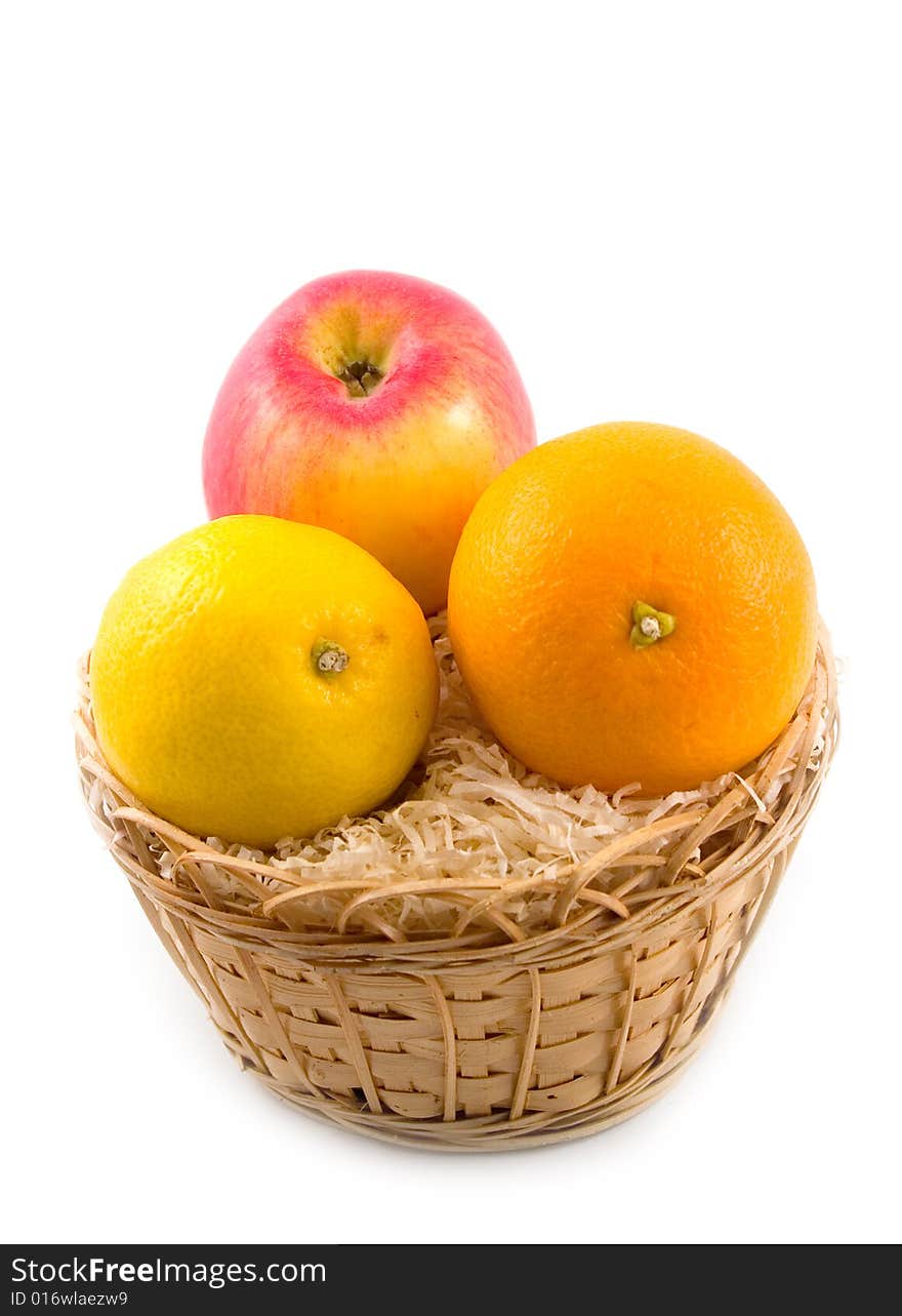 Sour lemon with beautiful fruit orange and apple in basket on white background