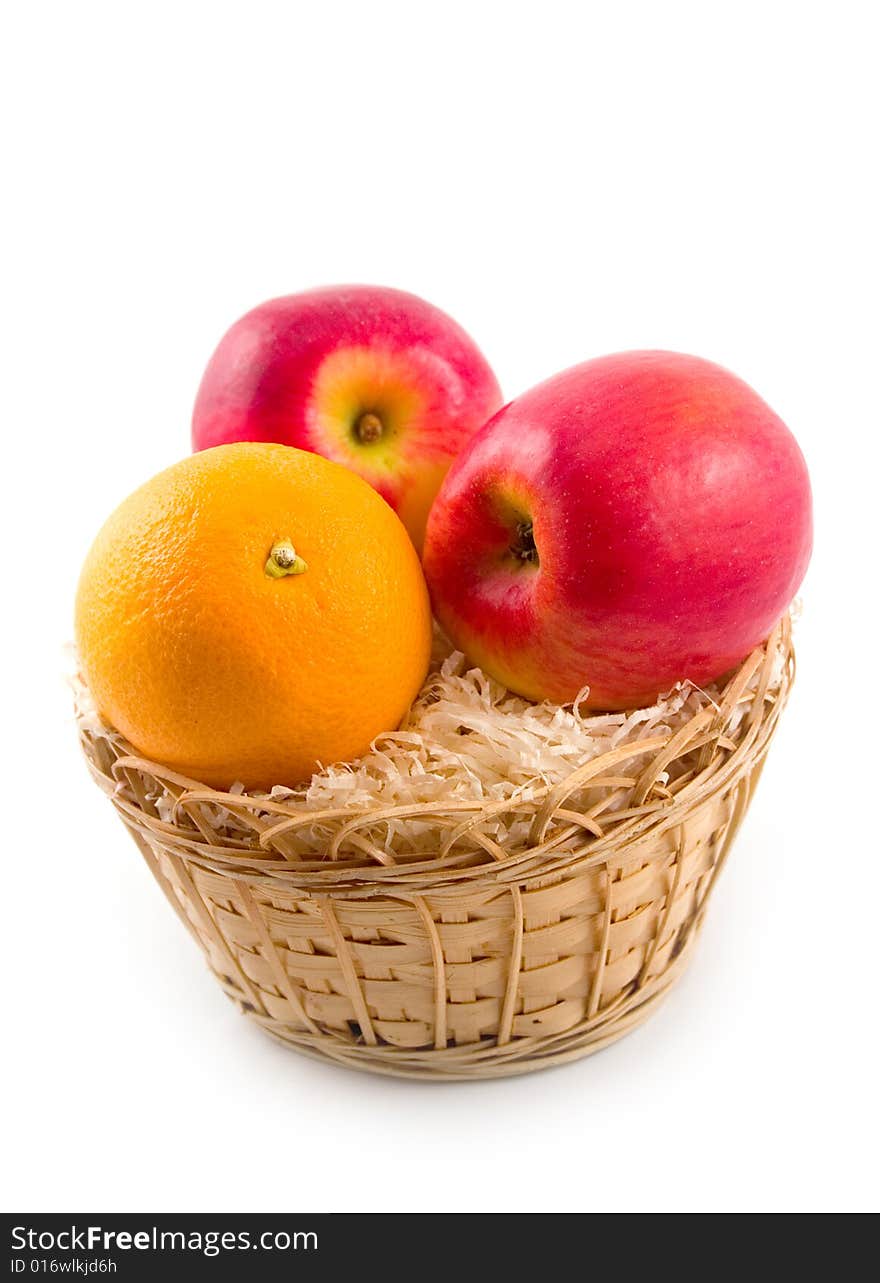 Ripe tasty useful fruit orange and apples on white background