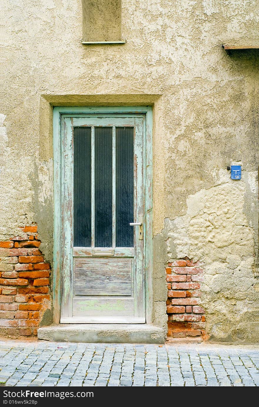 A shot of a grunge house facade. A shot of a grunge house facade