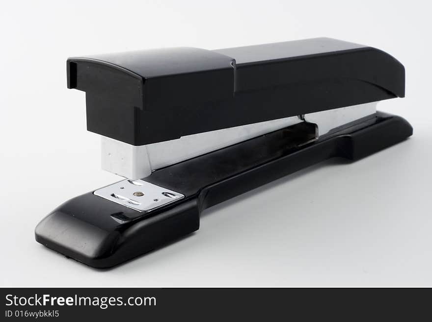 Office stapler on a white background