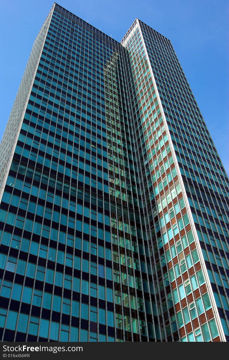 Tilt-up view of a skyscraper in London.