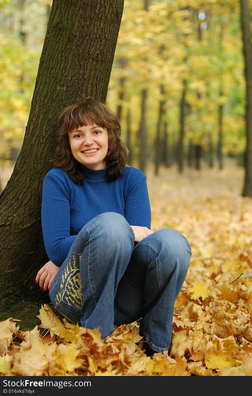 The girl on a background autumn forest