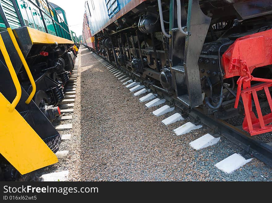 Locomotive and wagon on railroad station