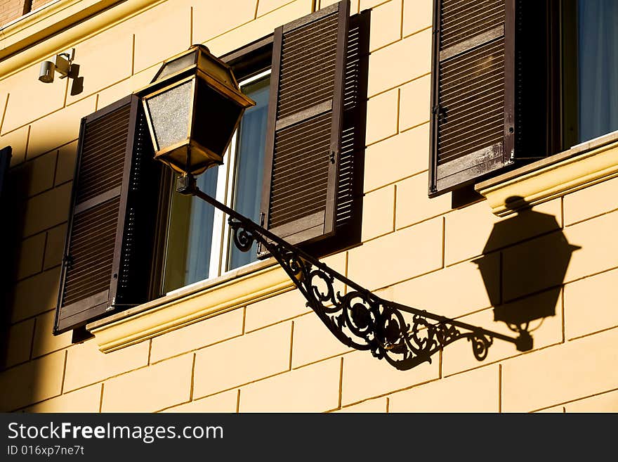 Windows on yellow wall in Rome, Italy. Windows on yellow wall in Rome, Italy