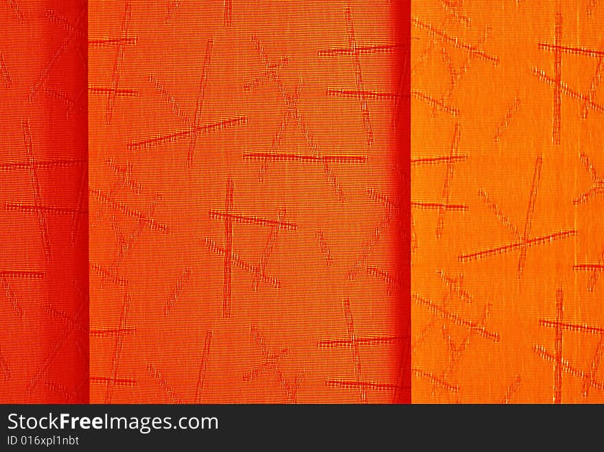 Orange background texture with red lines and dark shadows