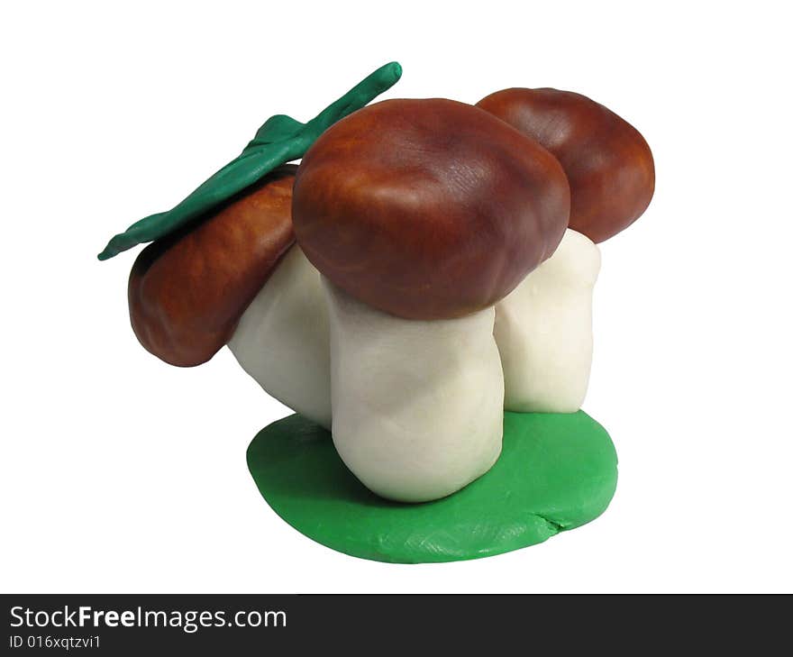 The beautiful mushrooms made the hands from plasticine and fruits of a chestnut. With clipping puths. The beautiful mushrooms made the hands from plasticine and fruits of a chestnut. With clipping puths.