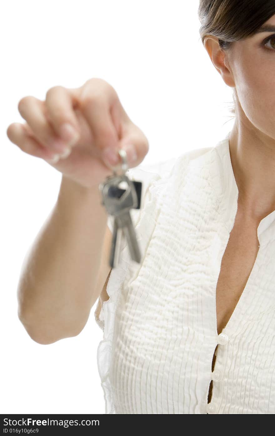 Lady with keys in her hand on an isolated white background