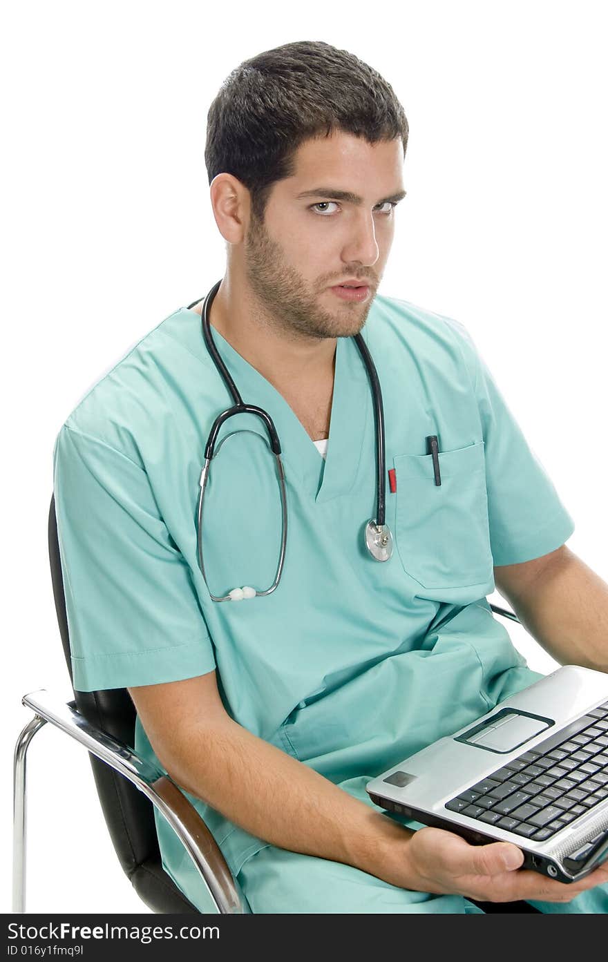 Sitting man looking you with laptop on an isolated background