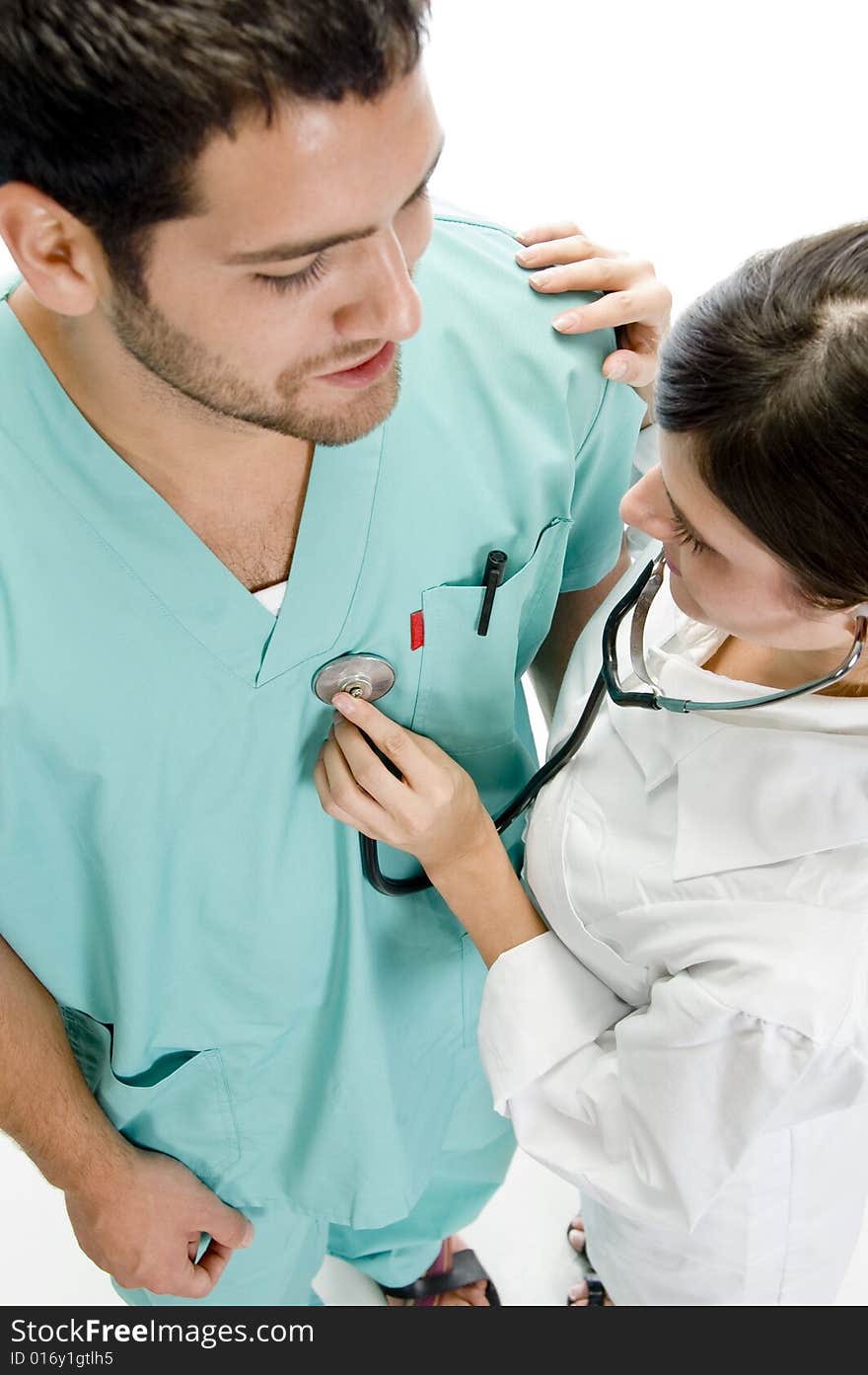 Nurse examining the patient with stethoscope with white background