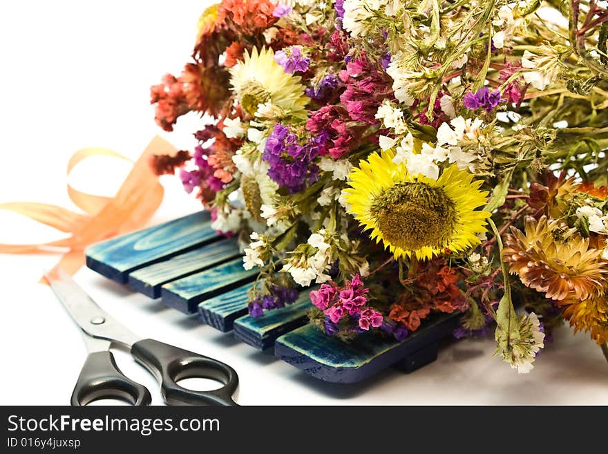 Variety of dry flowers ready to be tighten together. Variety of dry flowers ready to be tighten together.