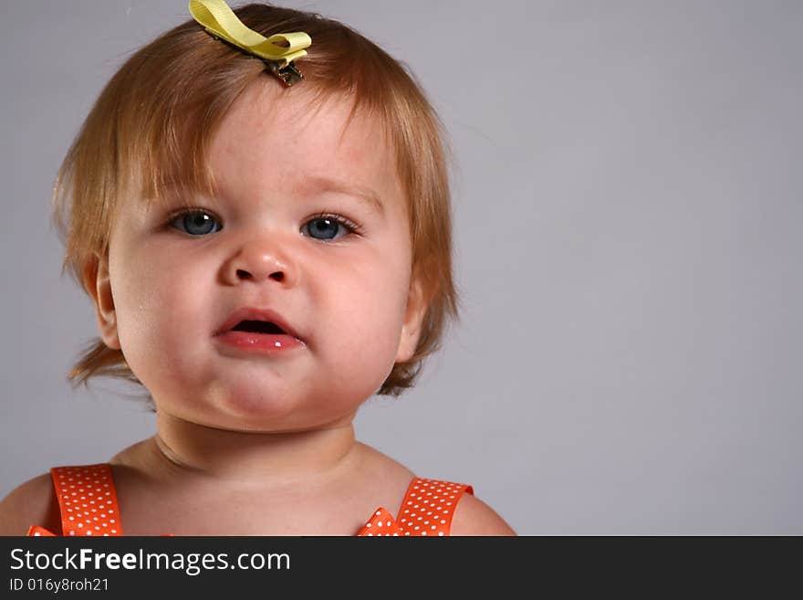 An angelic little baby girl checks out the world around her. An angelic little baby girl checks out the world around her