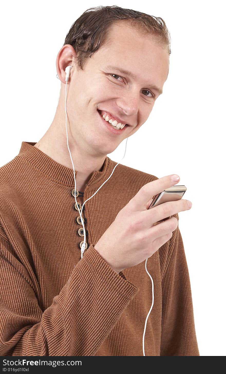 Young caucasian man wearing trendy clothes listening to music. Isolated on white background. Young caucasian man wearing trendy clothes listening to music. Isolated on white background