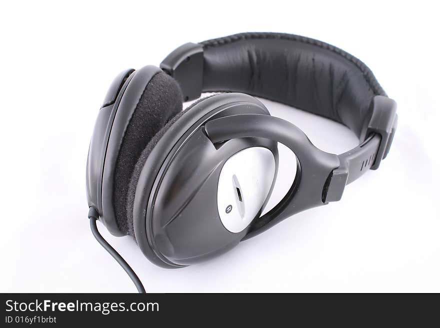 Headphones isolated black background, with cable, packshot