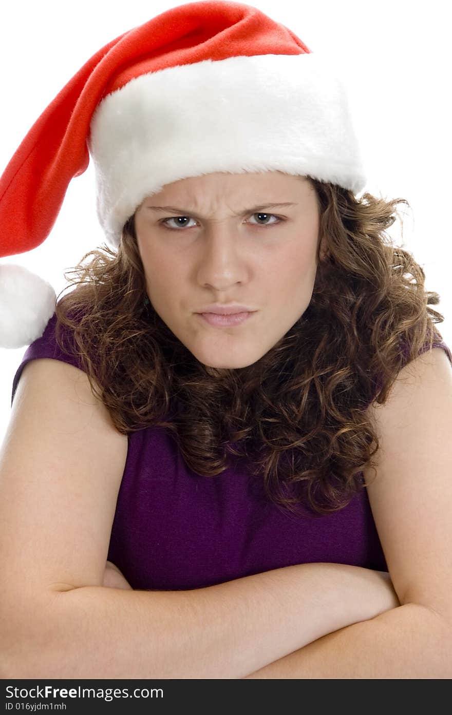 Young teenager angry with santa hat