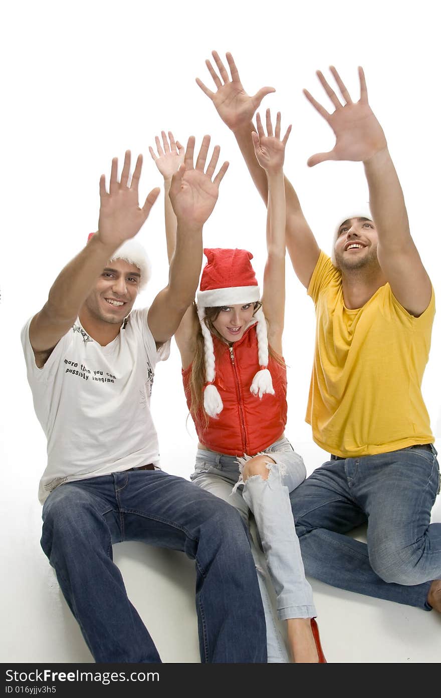 Young friends with raised hands with white background