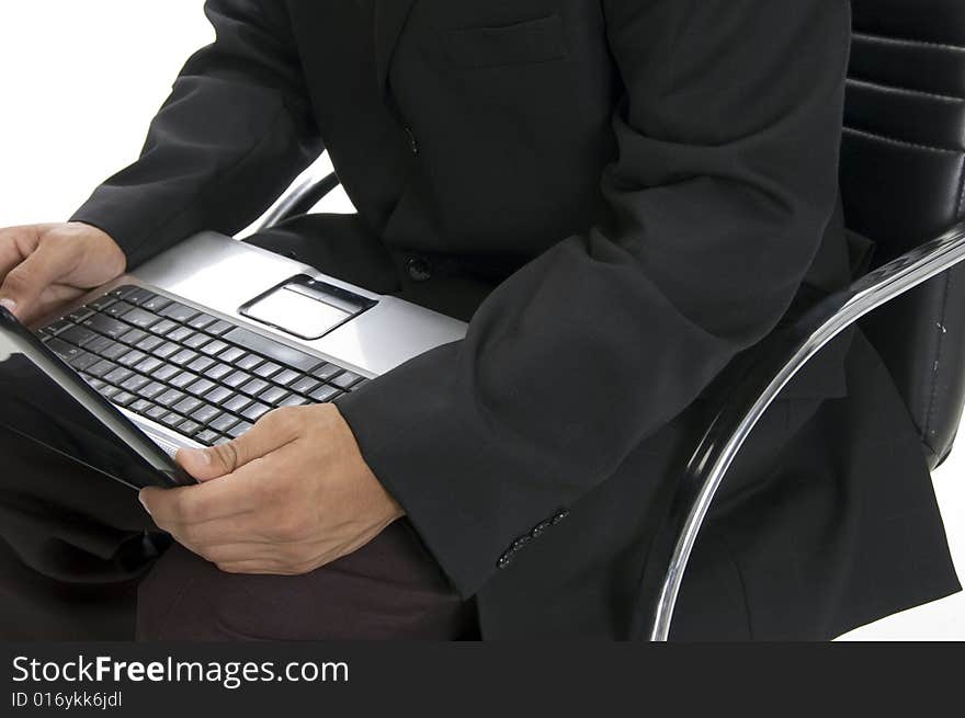 Male hands typing an a laptop close up with white background