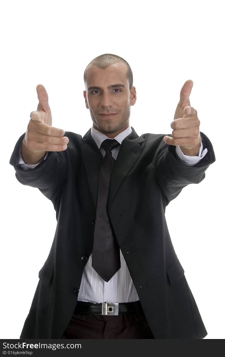 Cool successful businessman posing against white background