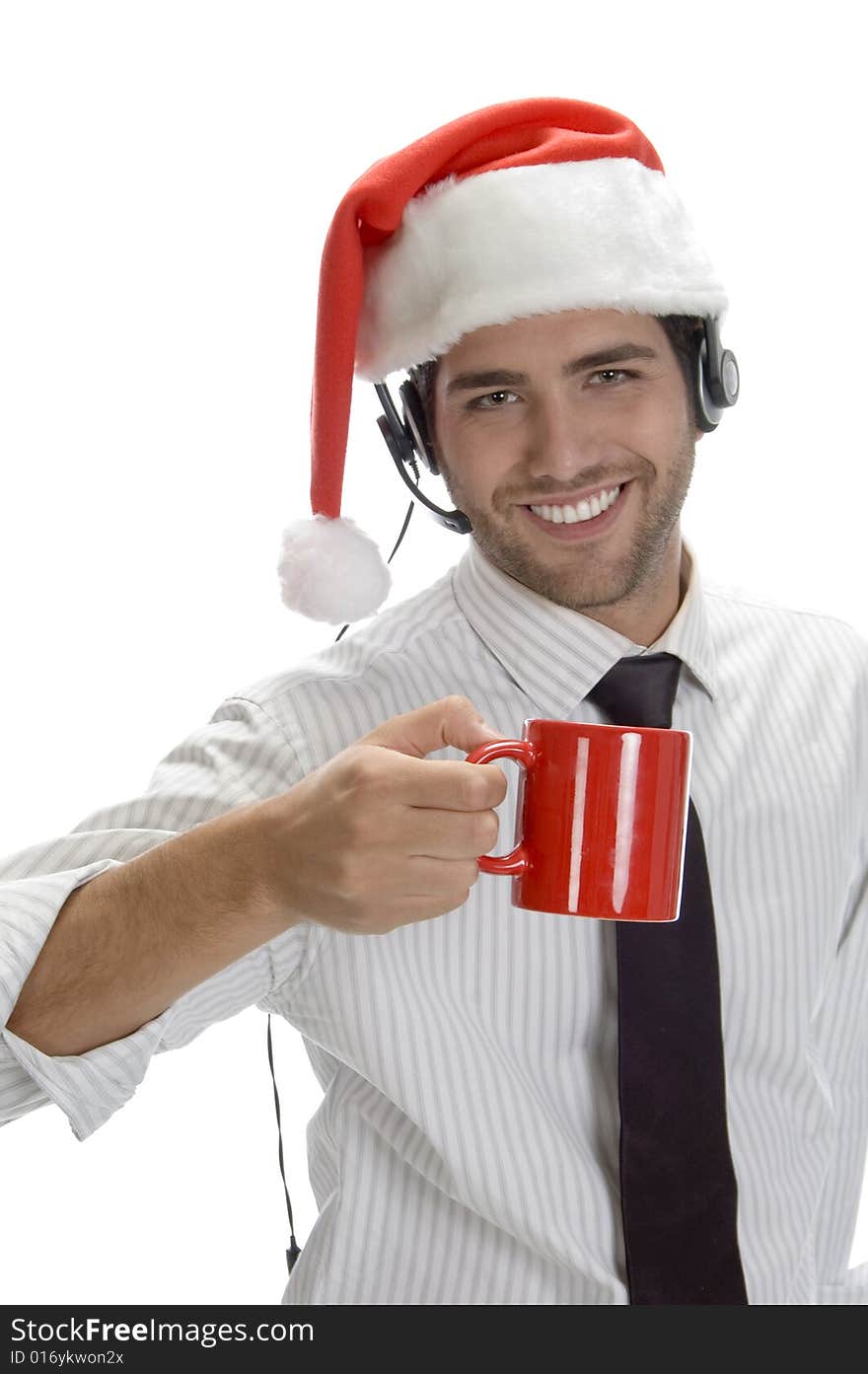 Young man enjoying coffee and wearing santa cap isolated on white background