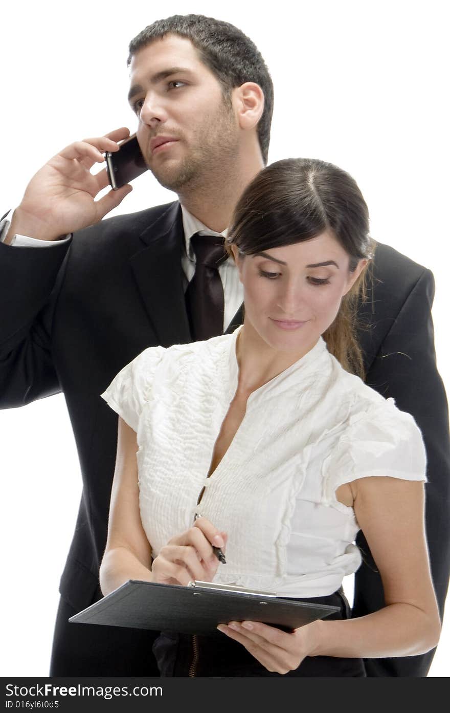 Young businessman busy with phone call with white background