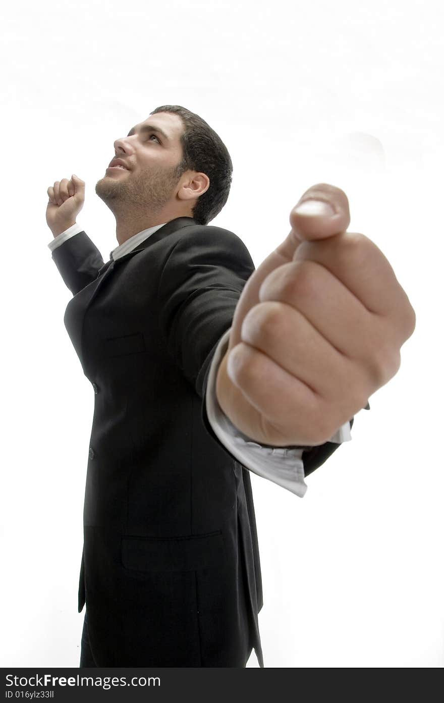 Cheerful businessman looking upward on an isolated background