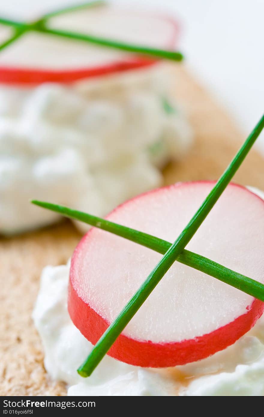 Cottage cheese on crispbread with radish. Cottage cheese on crispbread with radish