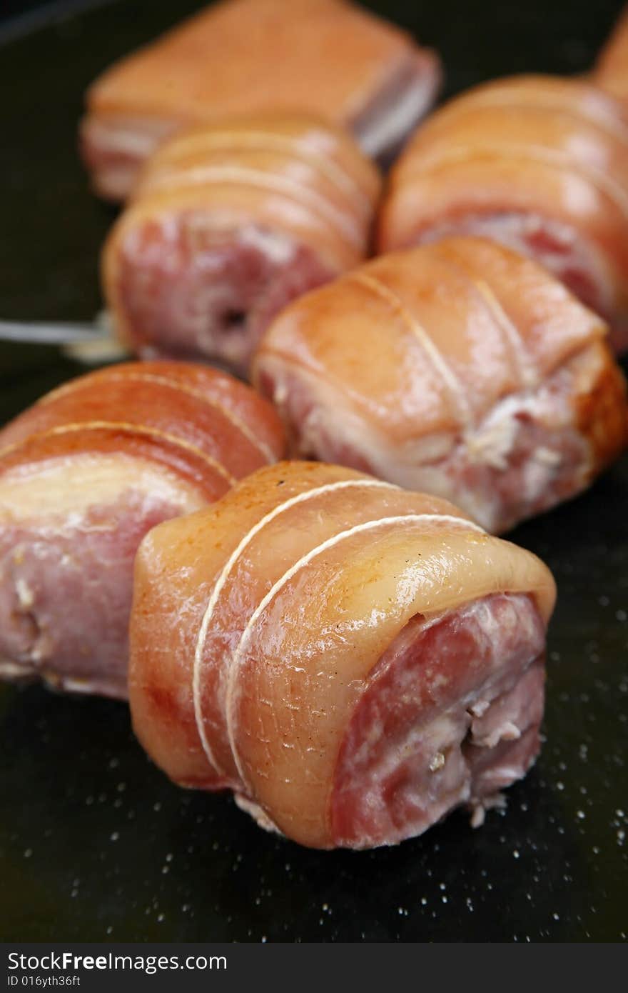 Fried porc on hot plate in market in France