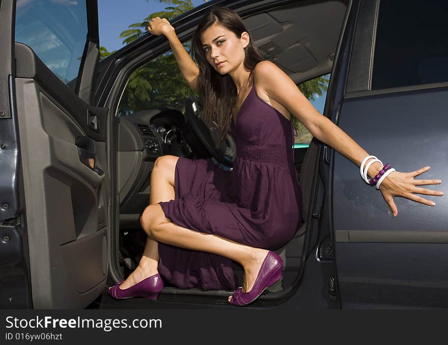 Woman on car