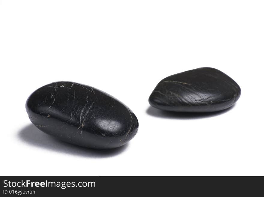 Black stones isolated on a white background. Black stones isolated on a white background