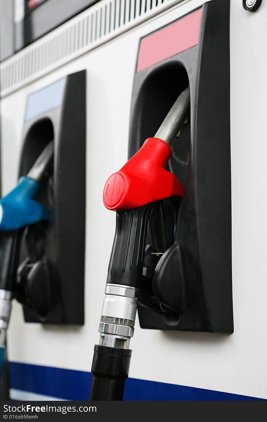 Refueling hose at modern petrol filling station