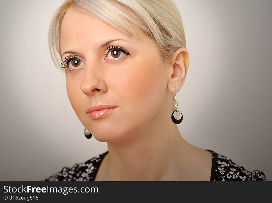 Gorgeous face of female on gradient background. Gorgeous face of female on gradient background