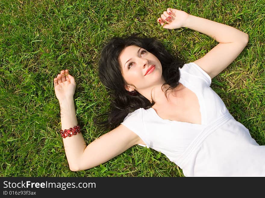 Woman rest on the grass