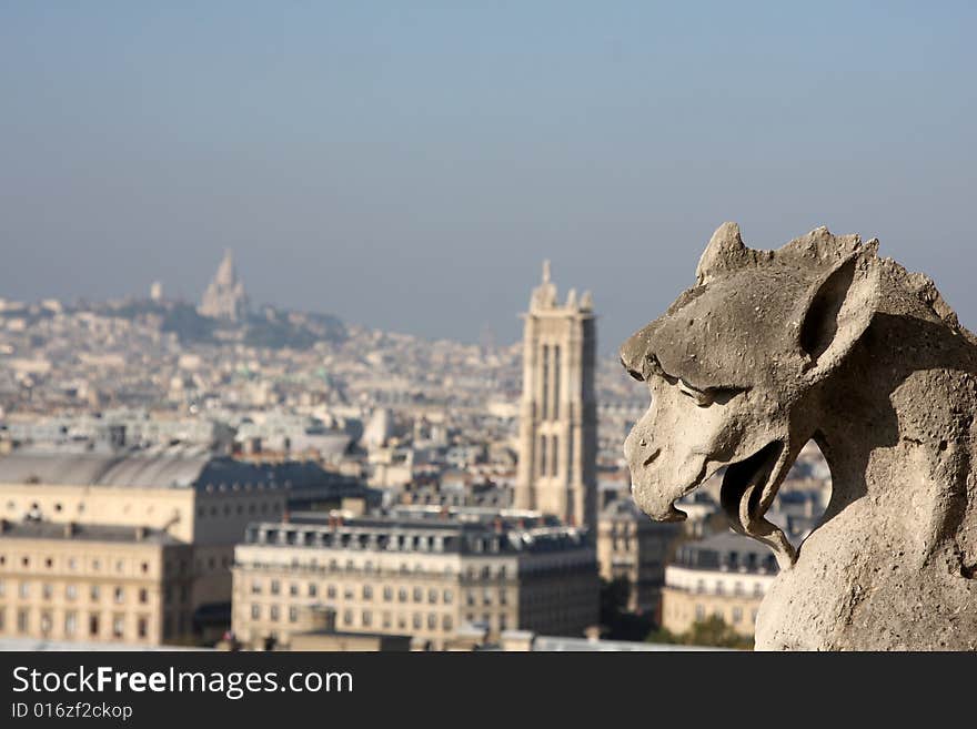 The Gargoyles of Notre Dame looking out over Paris