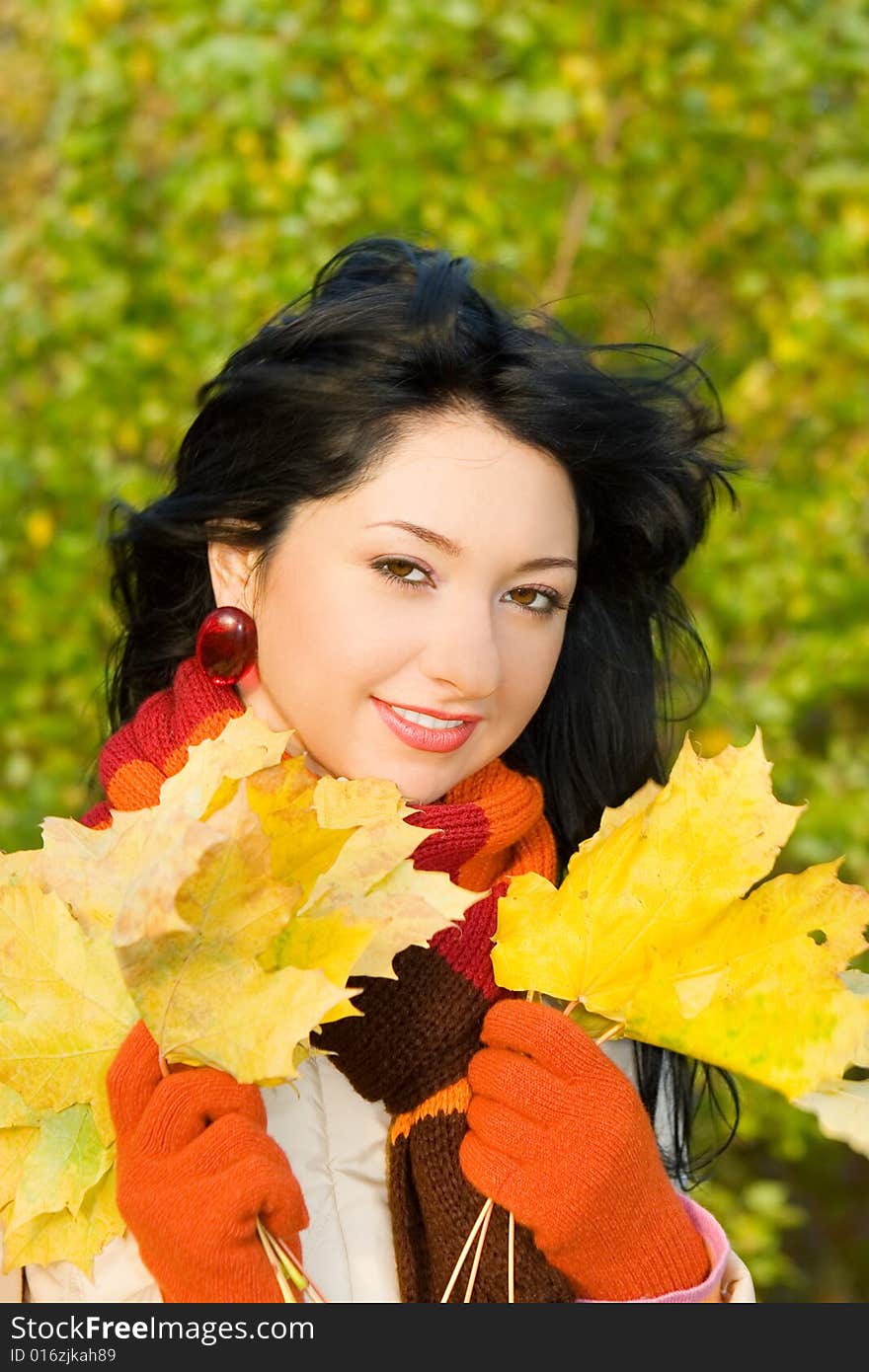 Young Woman In The Autumn Park