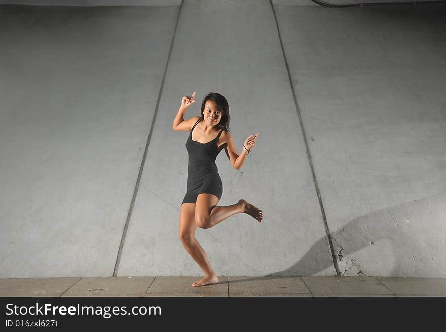 Artistic Picture of a Dancer performing athletic contemporary dance moves. Artistic Picture of a Dancer performing athletic contemporary dance moves.