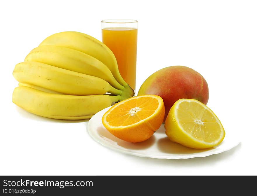 Tropical fruits and juice. Isolated on white.