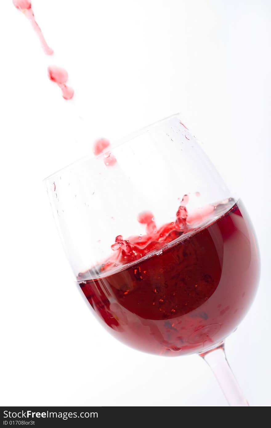 Red wine splash. White background.