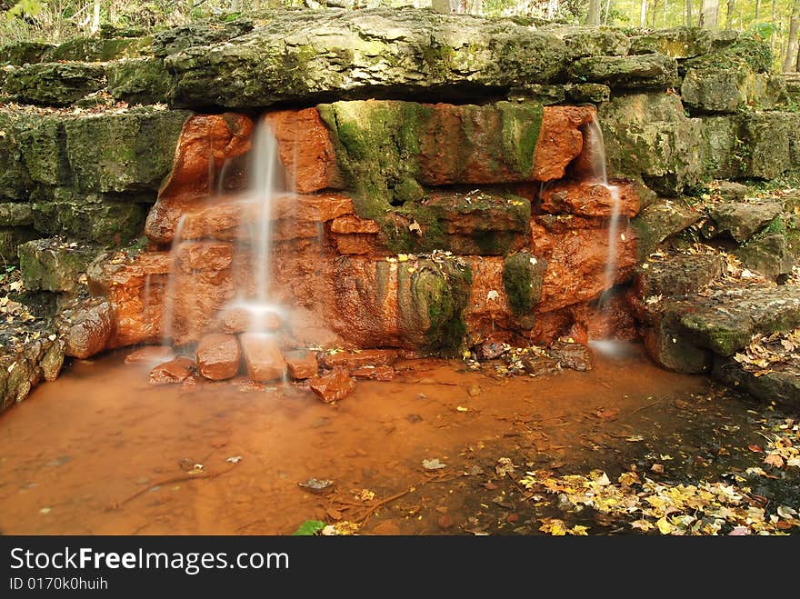 This is an Autumn scene. It has waterfalls,leaves and other naturally occurring items popular in fall scenes. This is an Autumn scene. It has waterfalls,leaves and other naturally occurring items popular in fall scenes.