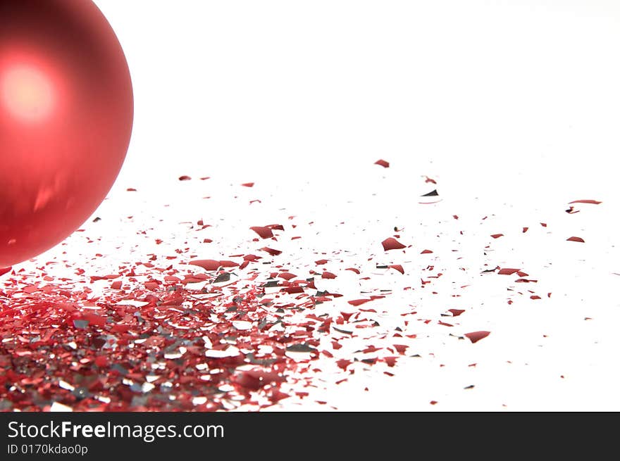 Red Christmas ball isolated on white background with glass splinters