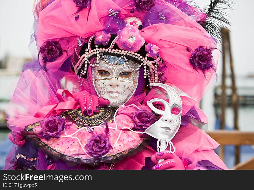 Pink costume at the Venice Carnival. Pink costume at the Venice Carnival