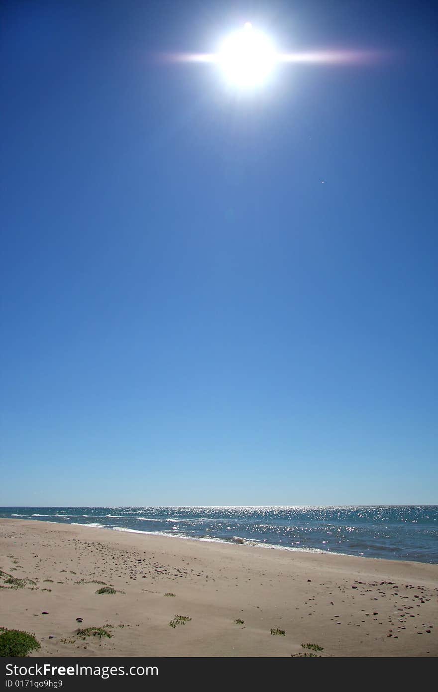 Sun in the sea beach in Europe