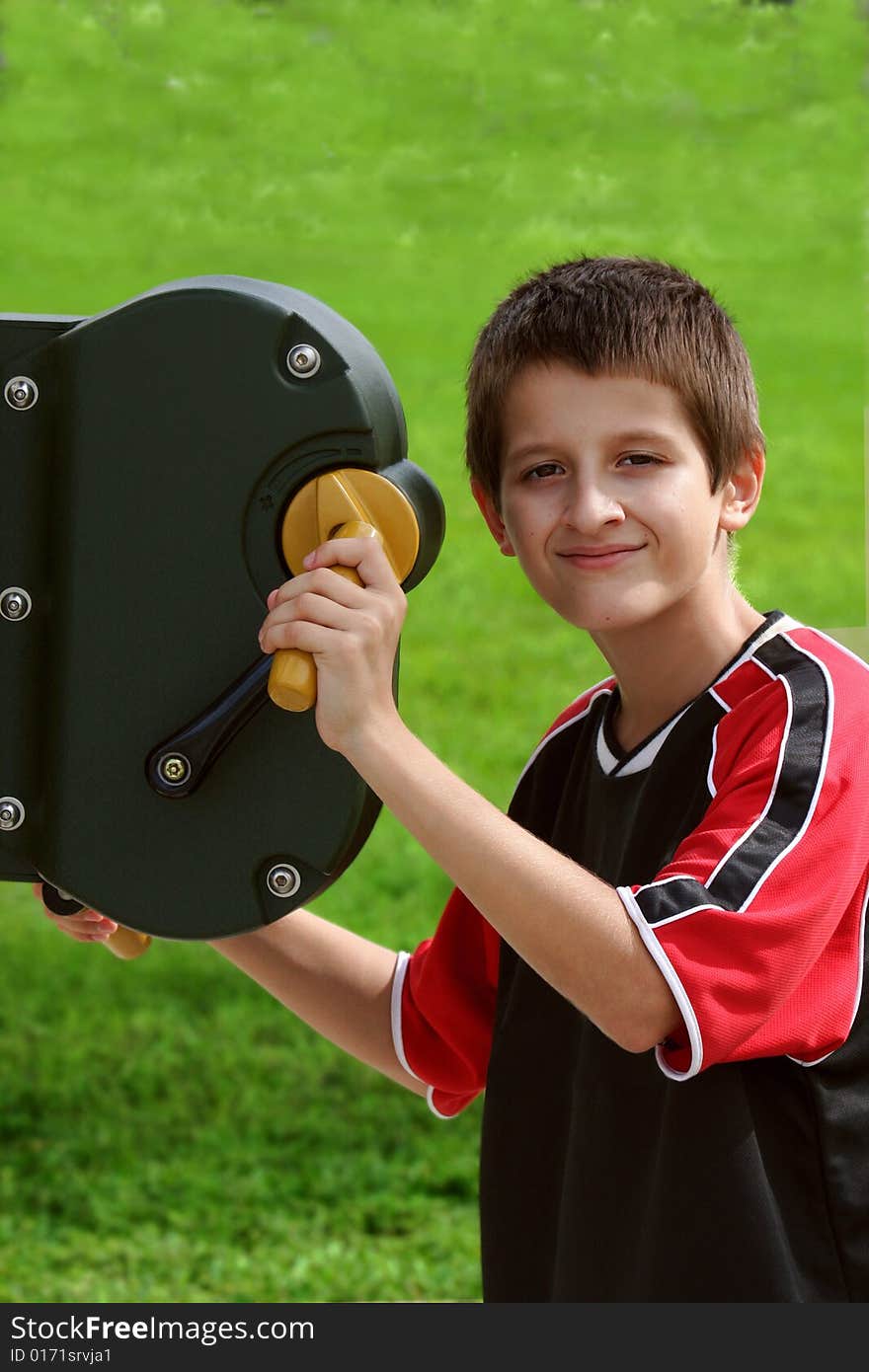 Teenager working  out in the park