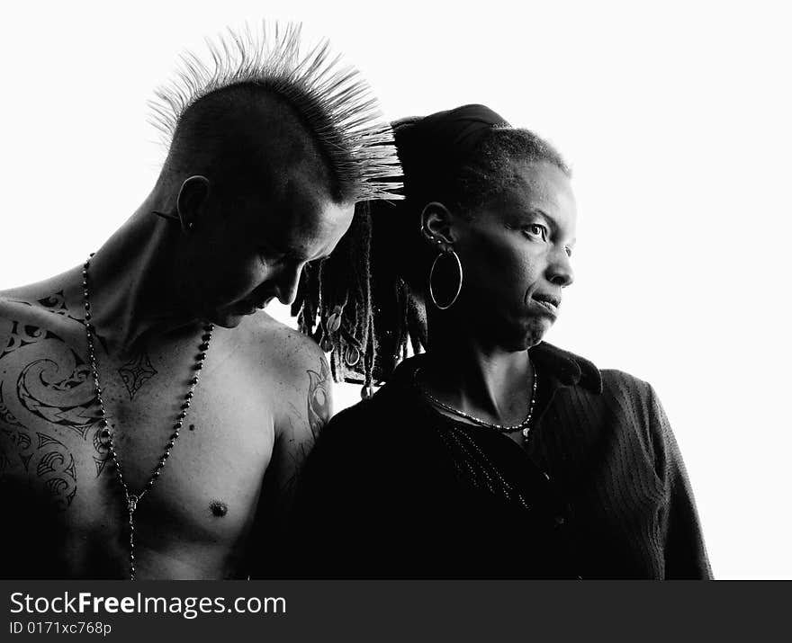 Man with Mohawk and Woman wearing Dreadlocks. Man with Mohawk and Woman wearing Dreadlocks