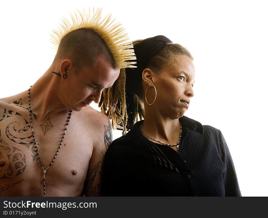 Man with Mohawk and Woman wearing Dreadlocks. Man with Mohawk and Woman wearing Dreadlocks