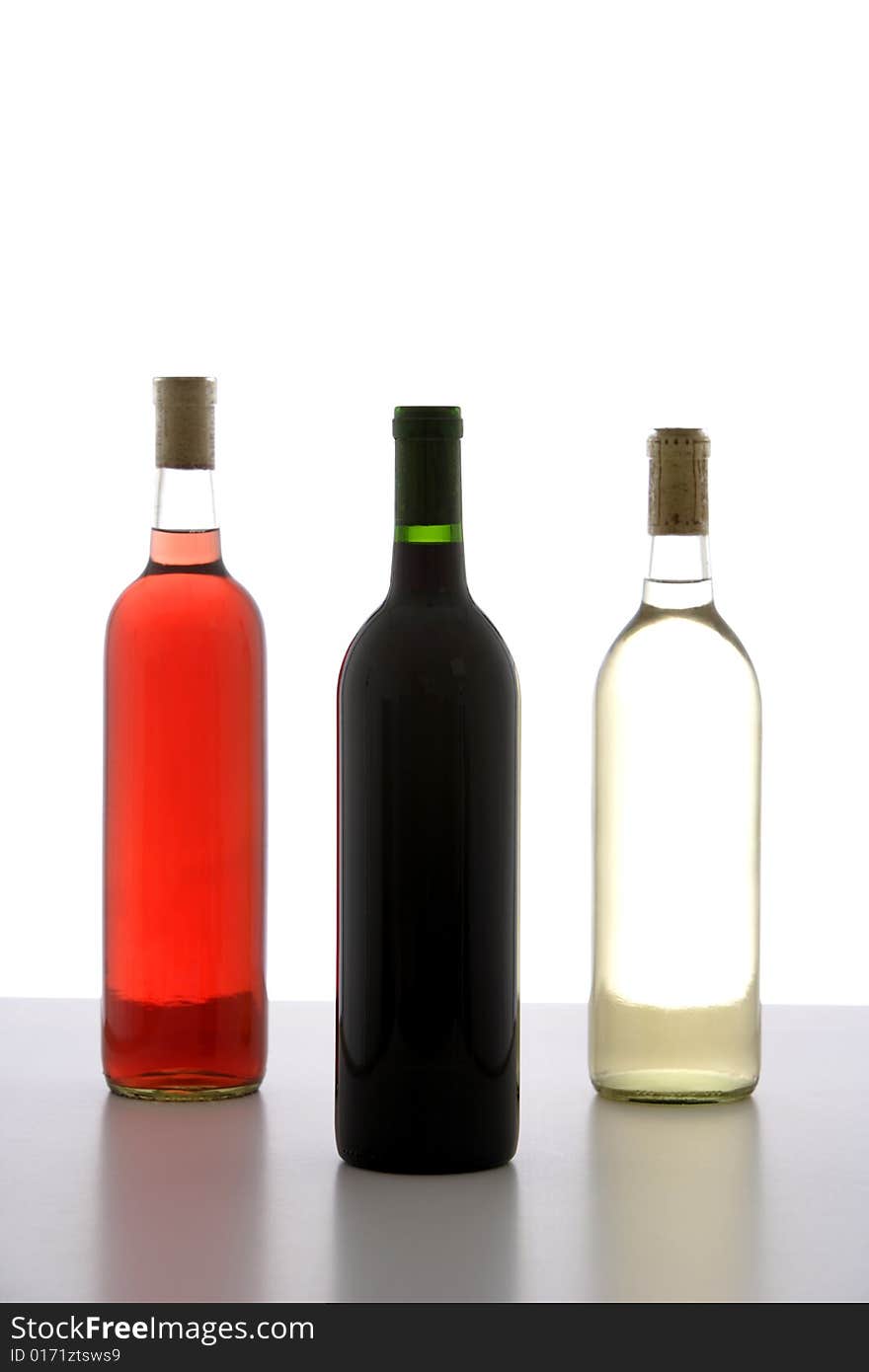 Three wine bottle red, white and rose in a row. Three wine bottle red, white and rose in a row