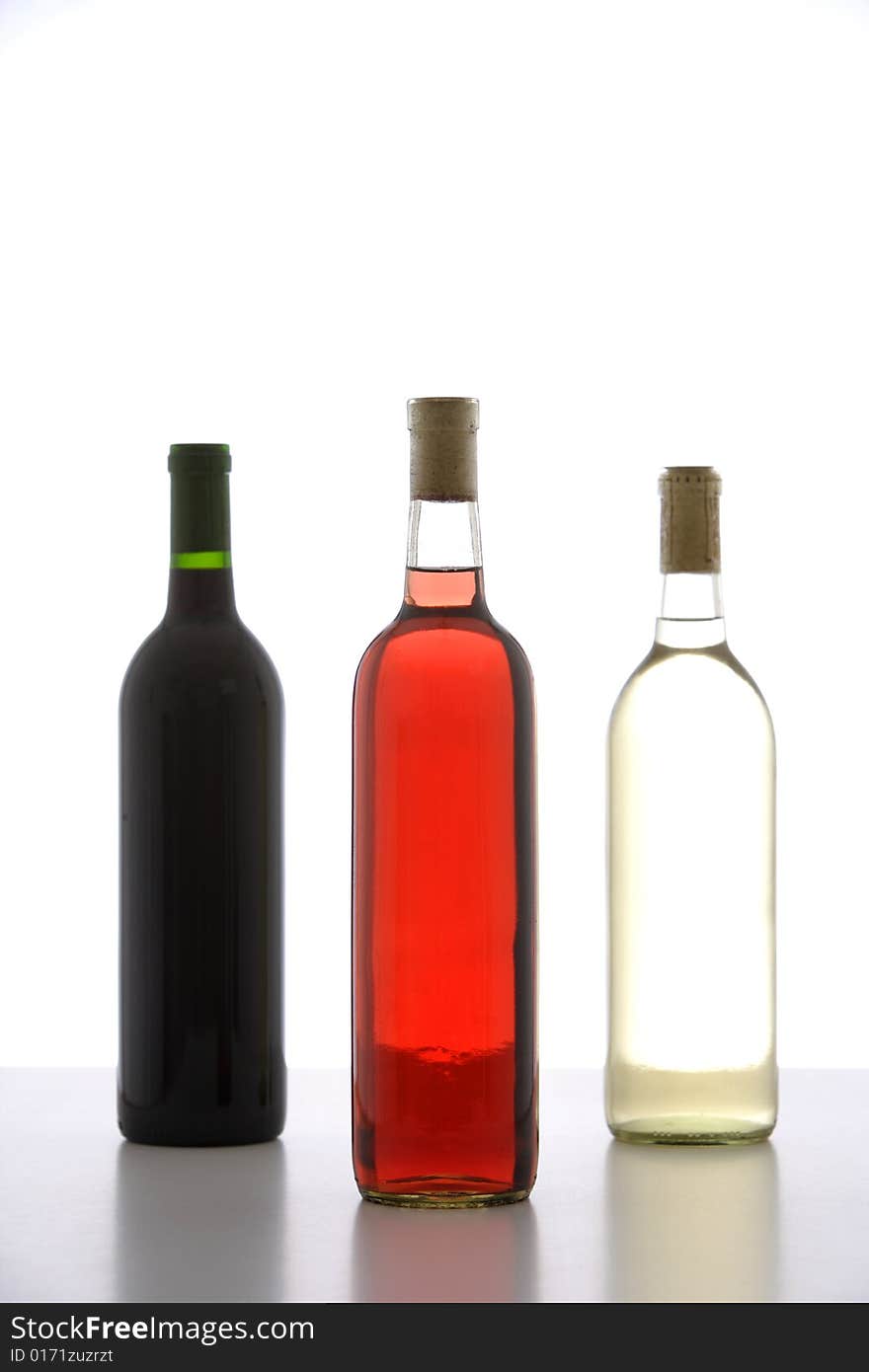 Three wine bottle red, white and rose in a row. Three wine bottle red, white and rose in a row