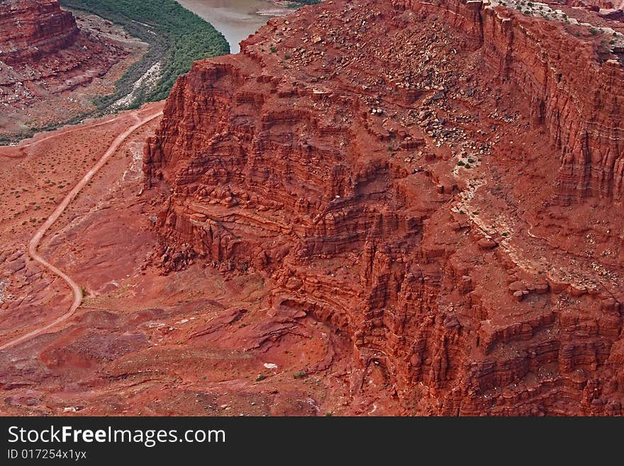 Close-up of red rock butte exposing the geological strata caused by erosion over the millennia. Close-up of red rock butte exposing the geological strata caused by erosion over the millennia