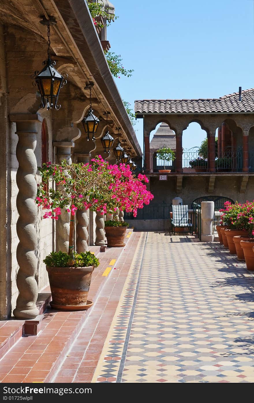 Vintage Spanish style architecture in California - terrace with column perspective