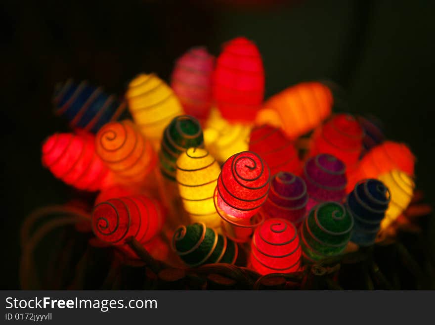 Many colorful objects in differently colors taken at night