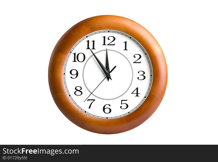 Round clock showing time about twelve