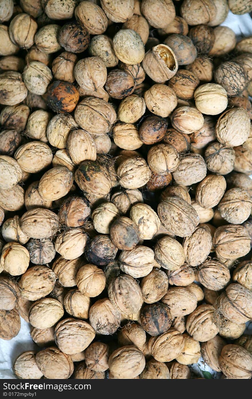 Brown walnuts background